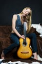 Cowgirl with guitar Royalty Free Stock Photo