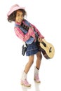 Cowgirl Happily Toting a Guitar Royalty Free Stock Photo