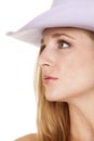 Cowgirl headshot side look purple hat