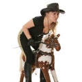 Cowgirl (jockey) race on hobbyhorse
