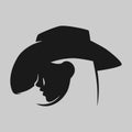 Cowgirl portrait symbol on gray backdrop Royalty Free Stock Photo