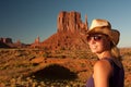 Cowgirl posing in monument valley