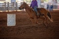 Cowgirl Rides At Speed In Barrel Racing Competition At Rodeo Royalty Free Stock Photo
