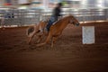 Cowgirl Rides Horse In Barrel Racing Event At A Rodeo Royalty Free Stock Photo