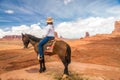 Cowgirl riding horse in Monument Valley Navajo Tribal Park in USA Royalty Free Stock Photo