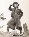 Cowgirl tipping her hat Royalty Free Stock Photo