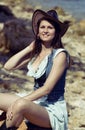 Cowgirl woman smiling happy. Girl in the hat. Royalty Free Stock Photo