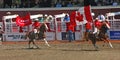 Cowgirls galloping on horseback