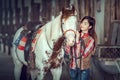 Cowgirls working at a horse farm,Sakonnakhon,Thailand. Royalty Free Stock Photo