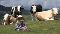 Cowherd Child Pasturing Cows, Farmer Girl Smelling Flowers on Grass Meadow 4K