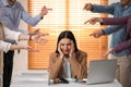 Coworkers bullying their colleague at workplace in office, closeup Royalty Free Stock Photo