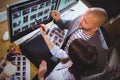 Coworkers discussing over computer at desk Royalty Free Stock Photo