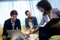 Coworkers having meeting around table Royalty Free Stock Photo