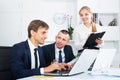 Coworkers working and notes to cardboard Royalty Free Stock Photo