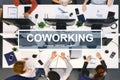 Coworking lettering over top view of working team Royalty Free Stock Photo