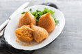 Coxinha de frango, typical brazilian chicken croquette on white dish Royalty Free Stock Photo