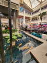 Coy fish pond in a market village mall in Thailand Royalty Free Stock Photo