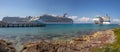 Cozumel, Mexico - December 31, 2019: Low angle panoramic shot of Carnival Freedom and other cruise ships docked in Cozumel.