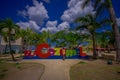 COZUMEL, MEXICO - MARCH 23, 2017: Plaza located in dowtown in the colorful Cozumel. with a colorful informative sign Royalty Free Stock Photo