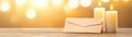 Cozy ambiance, candlelight illuminates envelope on rustic wooden table elegantly Royalty Free Stock Photo