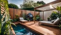 the cozy atmosphere of a homely patio in the back garden with wooden decking, tropical plants and a mini-pool