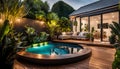 the cozy atmosphere of a homely patio in the back garden with wooden decking, tropical plants and a mini-pool