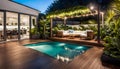 the cozy atmosphere of a homely patio in the back garden with wooden decking, tropical plants and a mini-pool