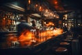 Cozy and atmospheric bar at night with a row of bar stools Royalty Free Stock Photo