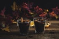Cozy autumn drink. Hot mulled wine with oranges and spices.