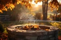 Cozy autumn evening with a stone fire pit surrounded by colorful leaves Royalty Free Stock Photo
