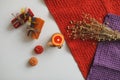 Cozy autumn hygge composition. still life with candle, leaves, pumpkin, textiles. Halloween, Thanksgiving. Flat lay, top view