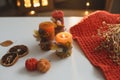 Cozy autumn hygge composition. still life with candle, leaves, pumpkin, textiles. Halloween, Thanksgiving. Flat lay, top view