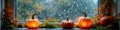 Cozy autumn scene with pumpkins and raindrops on a window Royalty Free Stock Photo