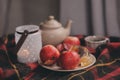 Cozy autumn weekend morning at home. Breakfast with cup of tea and bagel with apples Royalty Free Stock Photo