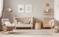 Cozy baby room interior with crib and toys Royalty Free Stock Photo