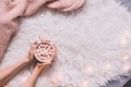 Cozy background. Hands holding mug of hot cocoa or hot chocolate