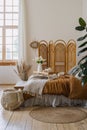 Cozy bedroom with authentic interior design at home Royalty Free Stock Photo