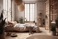 Cozy bedroom with boho style elements. Wooden bamboo furniture, natural textiles, wicker lampshades and decor, live Royalty Free Stock Photo