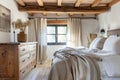 Cozy bedroom interior with wooden furniture and beige accents Royalty Free Stock Photo