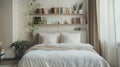 A cozy bedroom with a minimalist touch featuring a white upholstered bed frame and a wallmounted bookshelf. The lack of