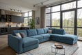 Cozy blue corner sofa in modern living room Royalty Free Stock Photo