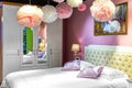 Cozy bridal bedroom interior decorated with paper pumps