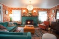 a cozy and bright bohemian living room, with plush sofas, patterned wallpapers, and a welcoming fireplace