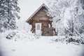 A cozy cabin in a winter wonderland Royalty Free Stock Photo