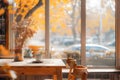 Cozy cafe interior with beautiful autumn view