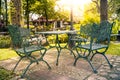 Cozy cafe table for chitchat, apply dark filter Royalty Free Stock Photo