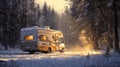 A cozy camper parked amidst a snow-covered forest during a winter sunset