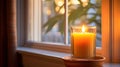 cozy candle in window Royalty Free Stock Photo