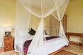 Cozy canopy bed in bedroom