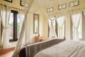 Cozy canopy bed in bedroom